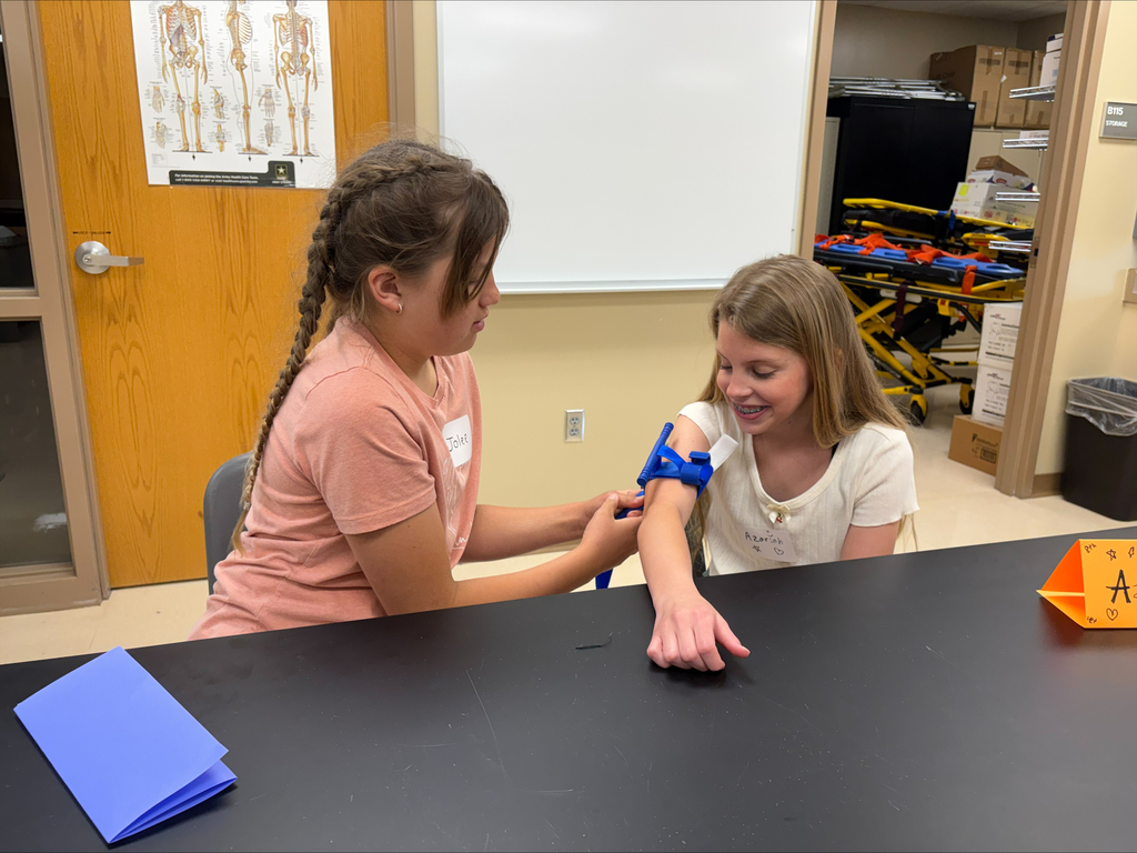 Students using a tourniquet