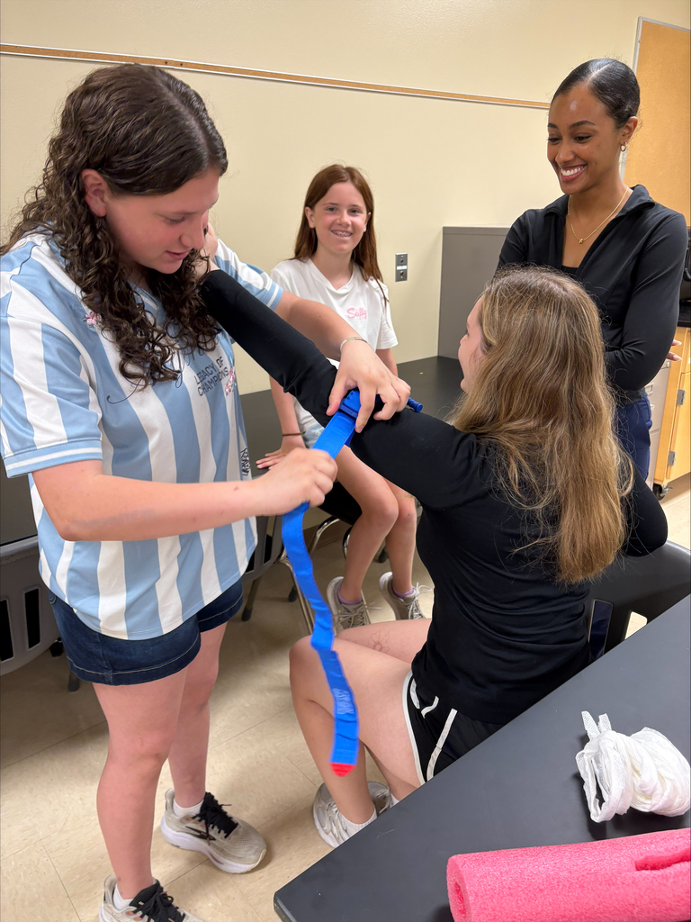 Students using a tourniquet