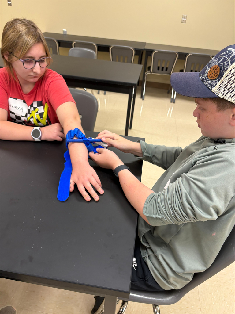 Students using a tourniquet
