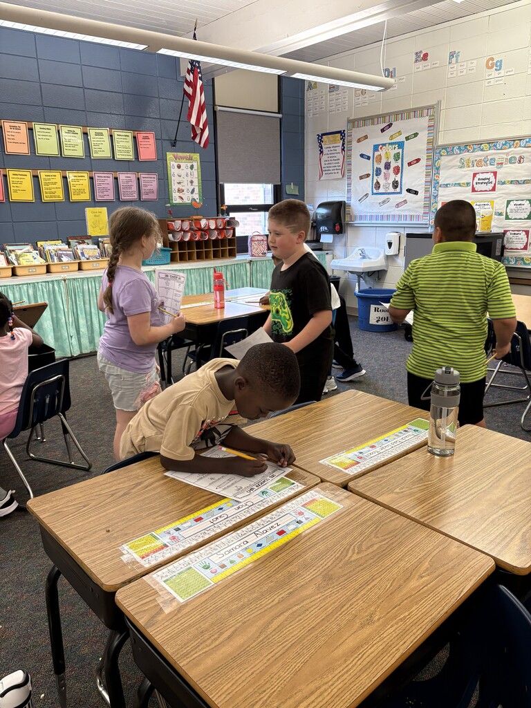 Students walking around the room.