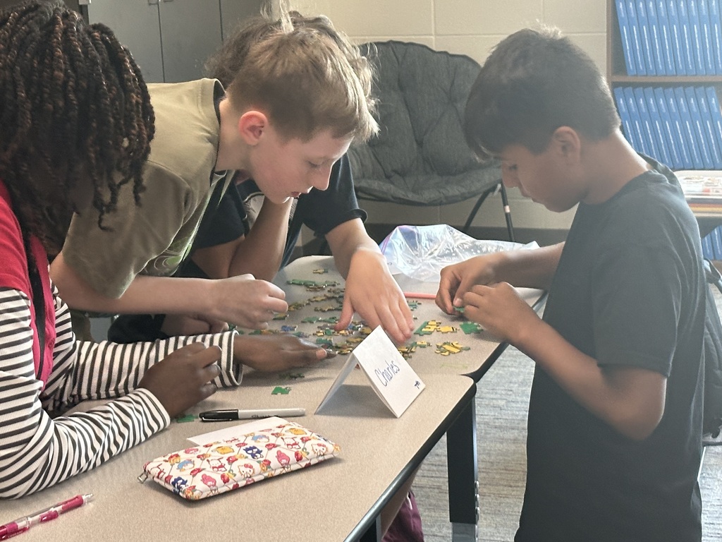 Students participate in puzzle races to kick off back to school.