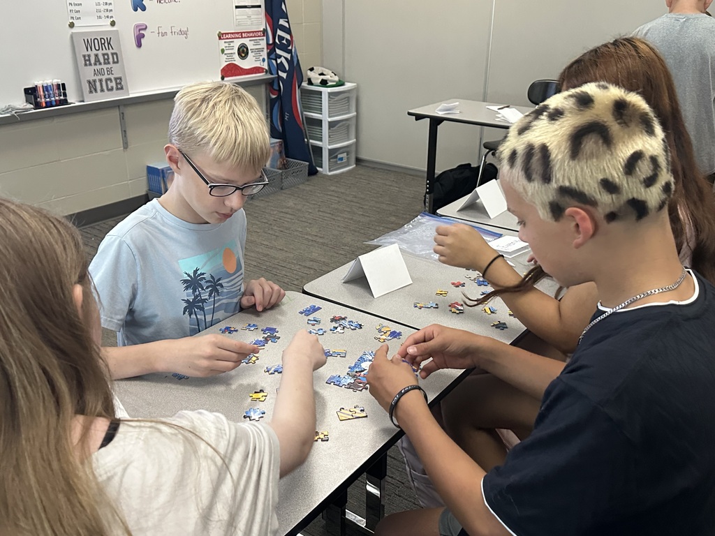 Students participate in puzzle races to kick off back to school.