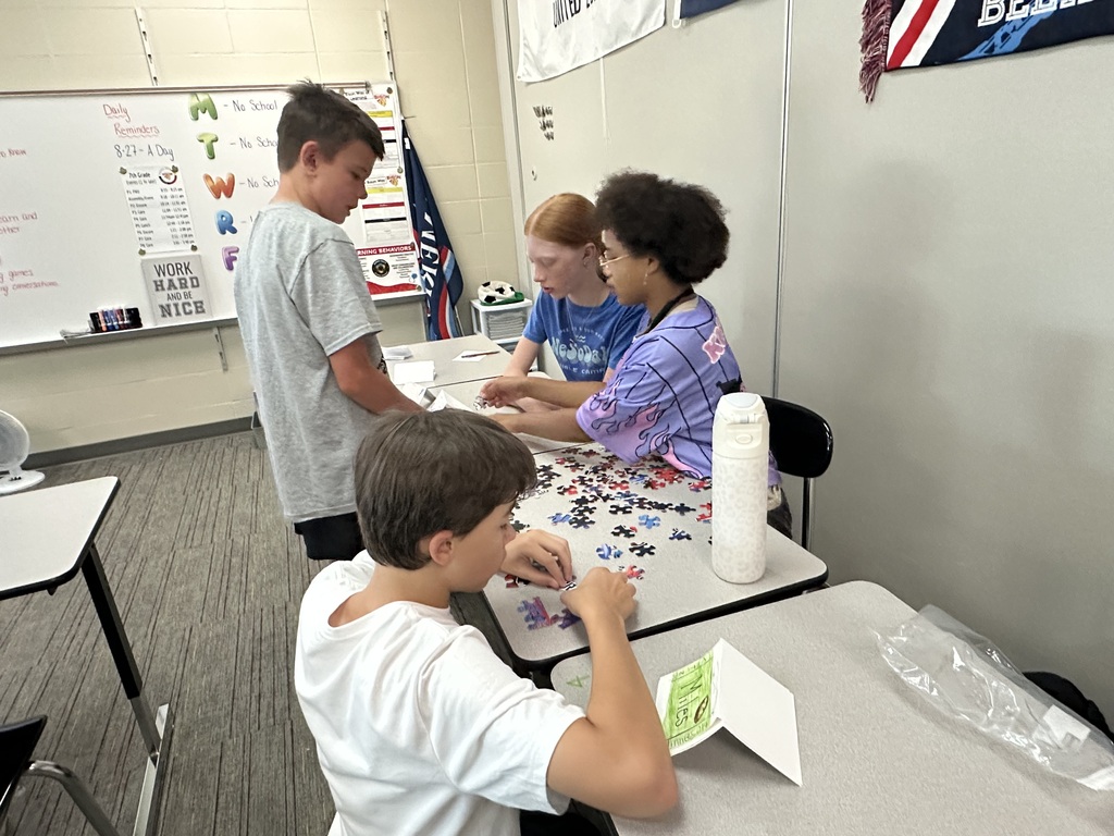 Students participate in puzzle races to kick off back to school.