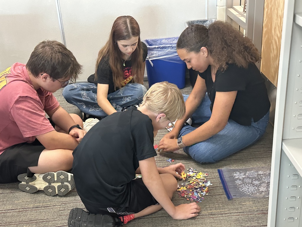 Students participate in puzzle races to kick off back to school.