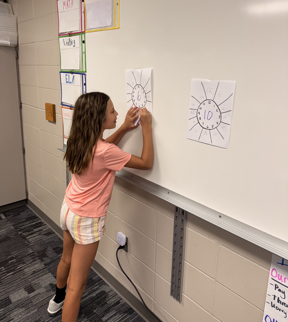 Student(s) racing to do multiplication problems.