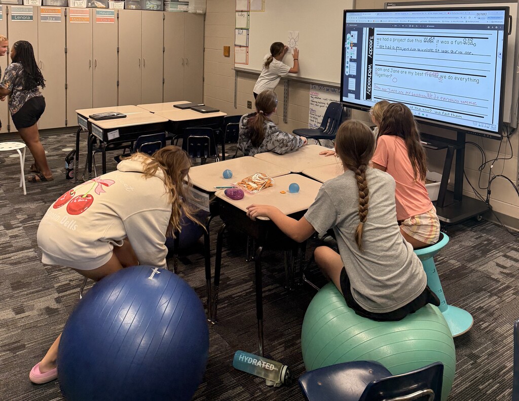 Student(s) racing to do multiplication problems.