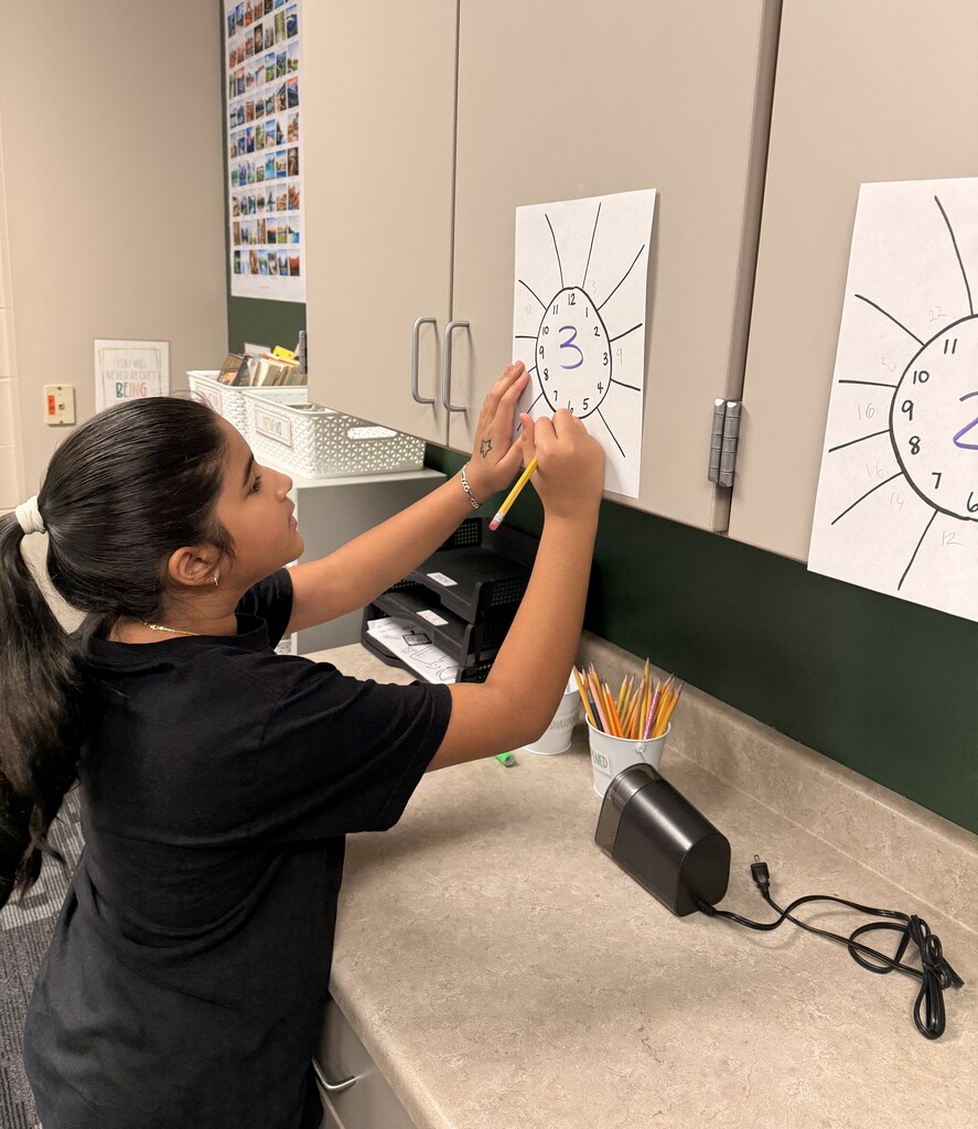 Student(s) racing to do multiplication problems.