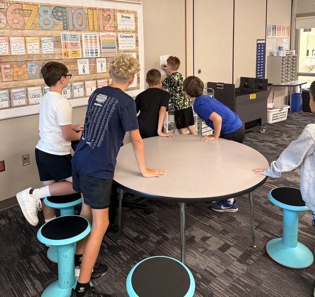 Student(s) racing to do multiplication problems.