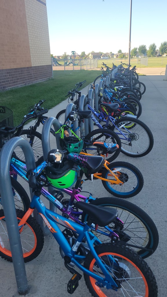 full bike rack in front of school
