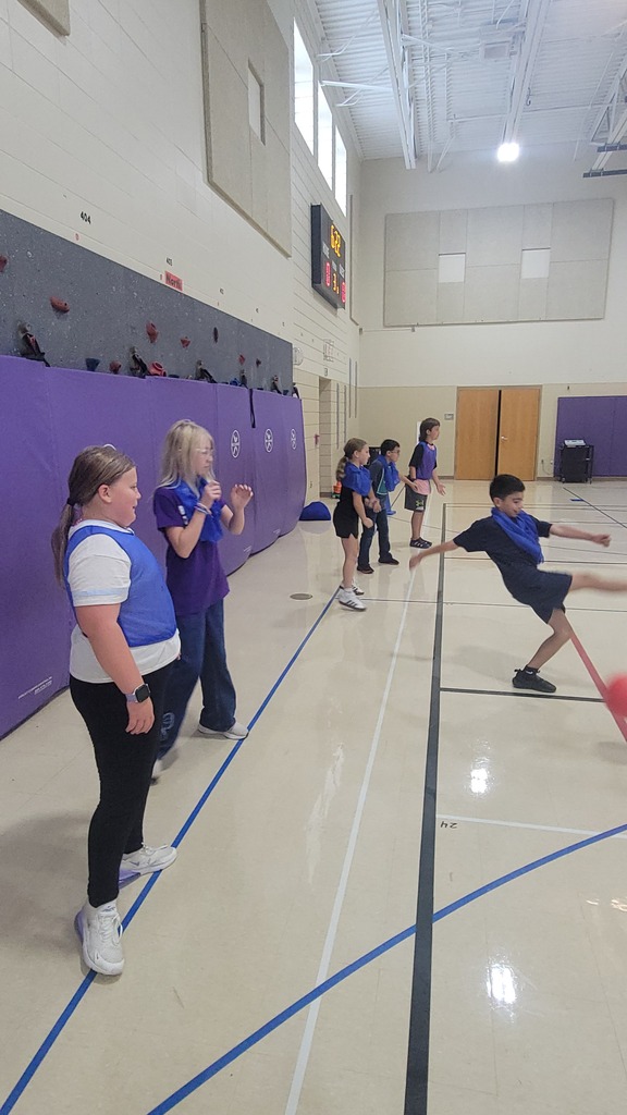 students playing kickball in pe