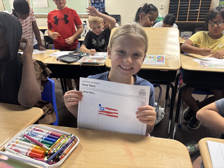 a student with their hero letter 