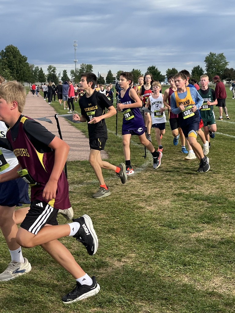 Cross country athlete running at the Nike Heartland Preview.