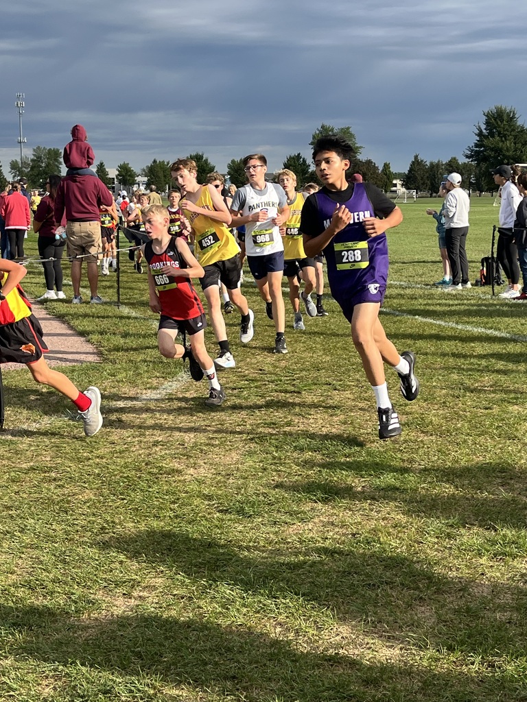 Cross country athlete running at the Nike Heartland Preview.