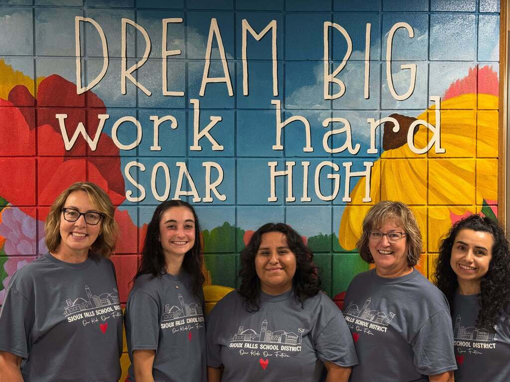 4th grade team in front of our new mural