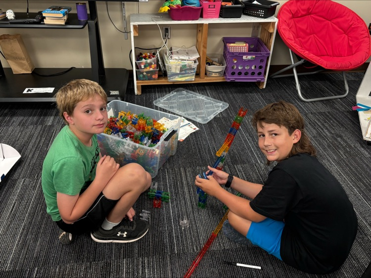 students playing marbles