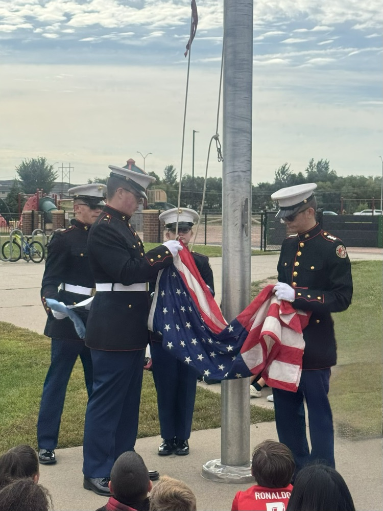 cadets hanging the flag 