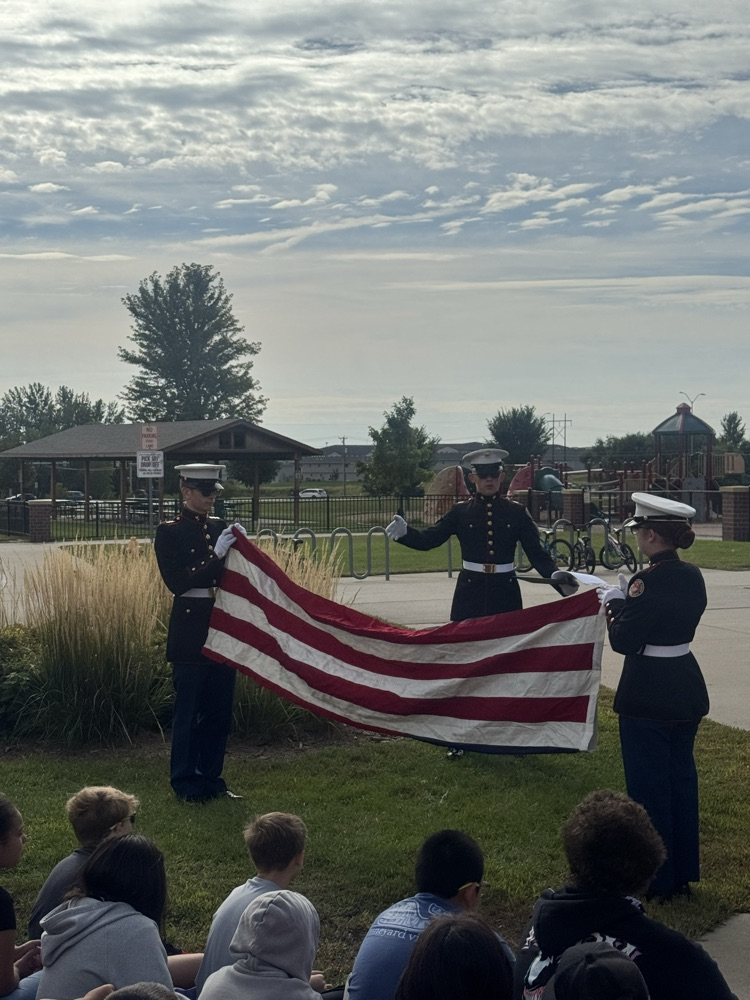 cadets folding the flag 