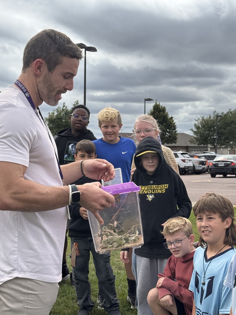 Students watching butterfly release