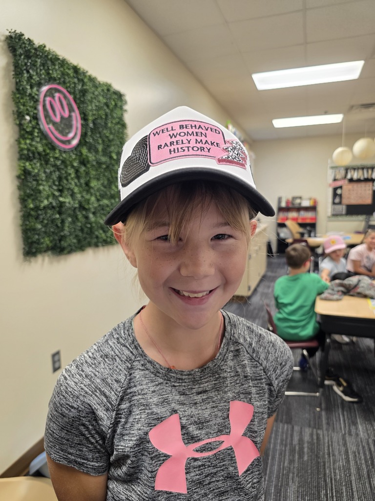 Hat day student wearing her hat