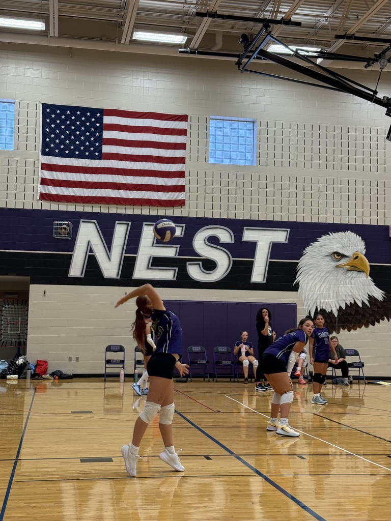 McGovern player serving the ball. 