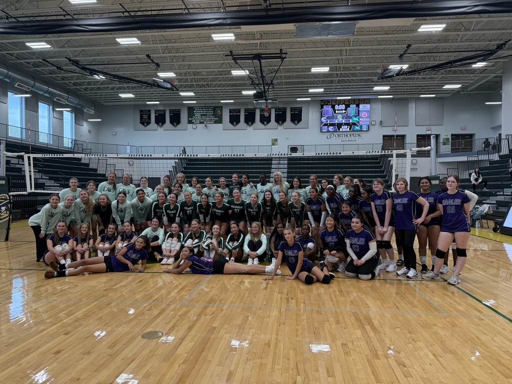 8th grade volleyball players after playing at Jefferson against Memorial. 