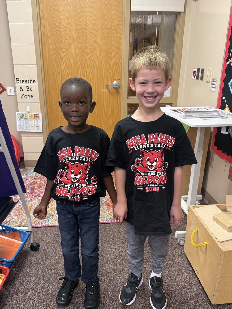 two boys dressed alike in Rosa Parks shirts