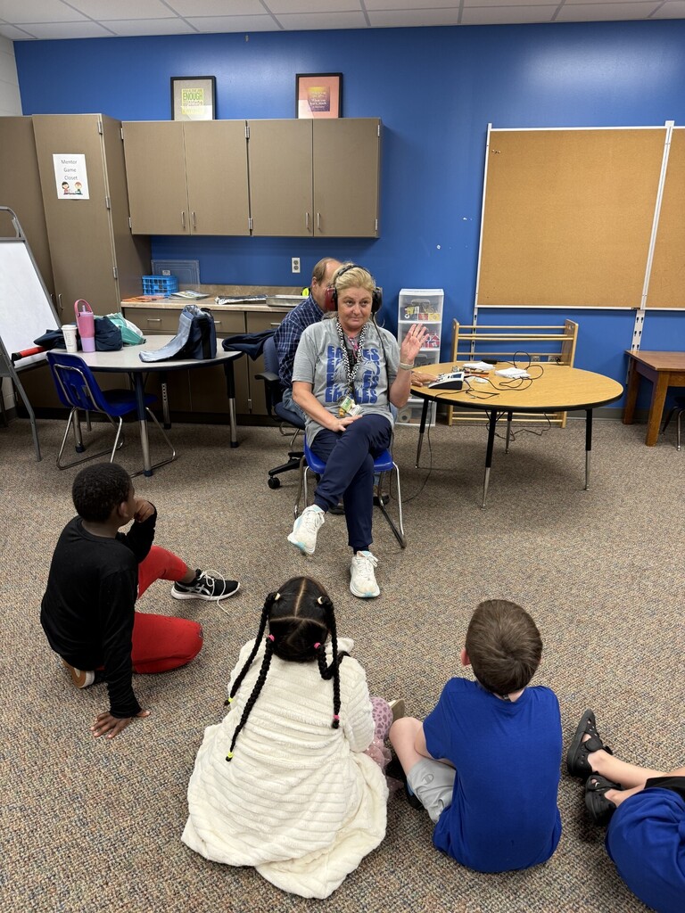 Mrs. Swanson getting her hearing tested. 