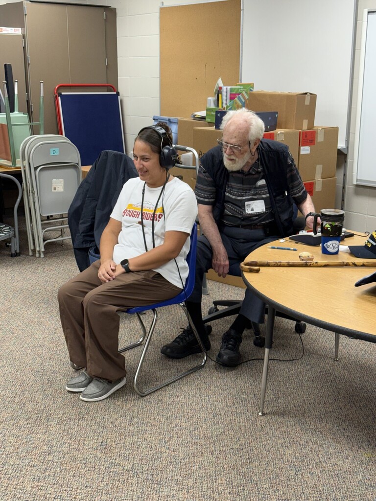 Mrs. Renville getting her hearing tested. 
