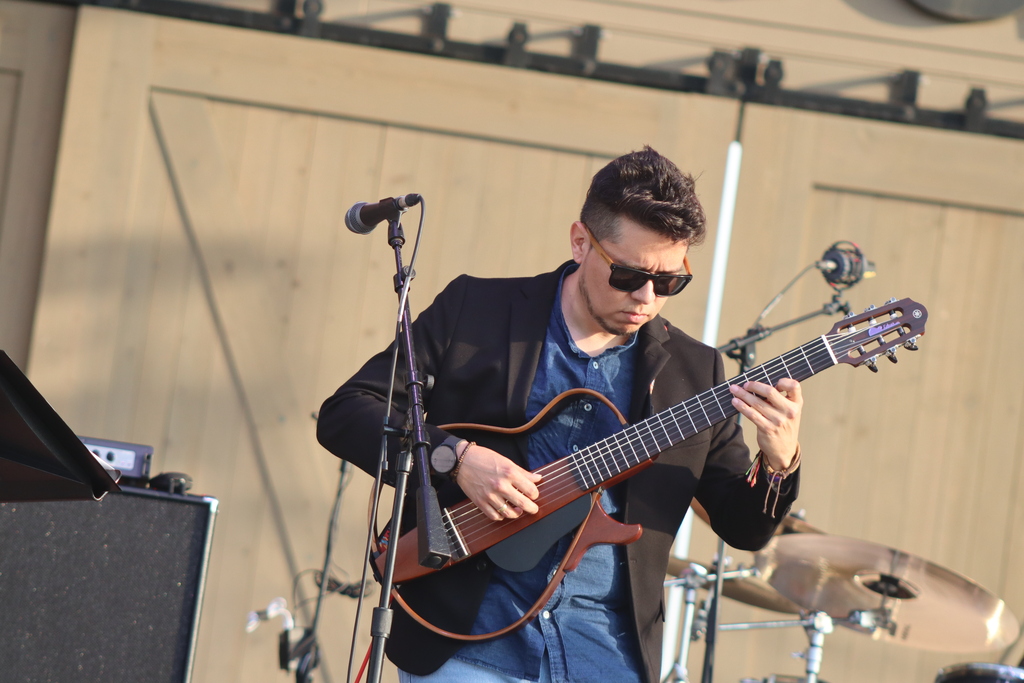 Mr. Galindo playing his guitar.