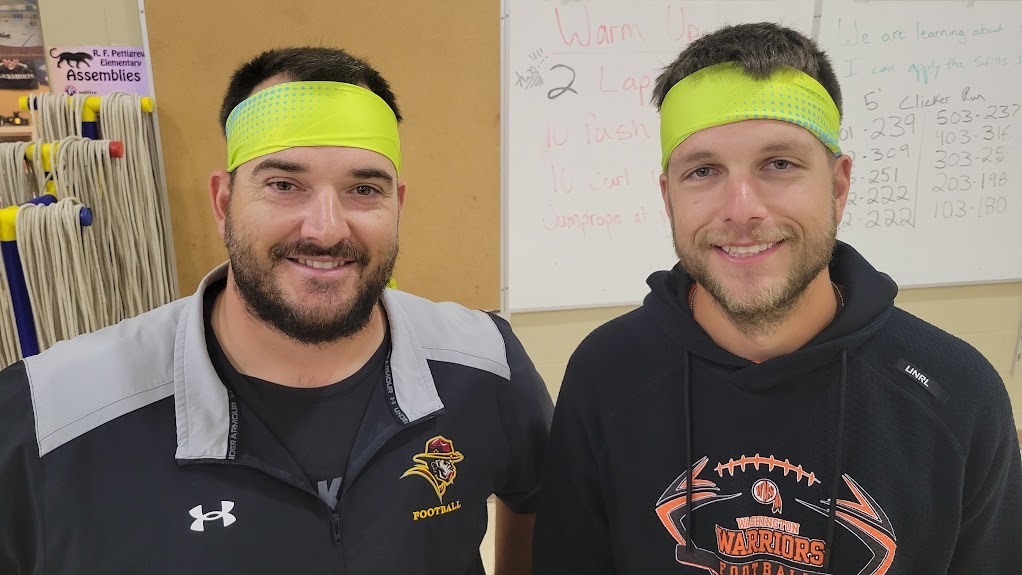PE teachers with ninja headbands on 
