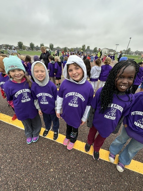 Students outside enjoying the fun run