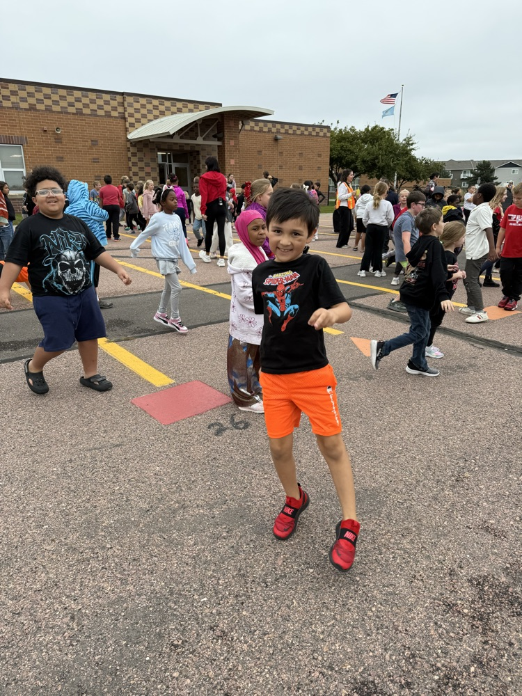 students on the playground dancing  