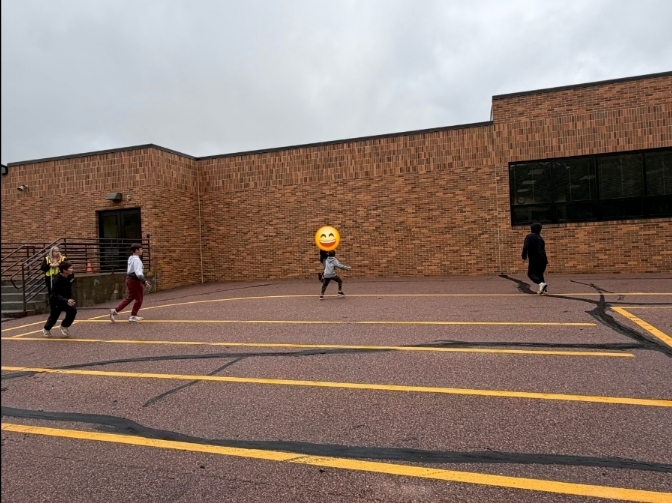 5 boys playing football