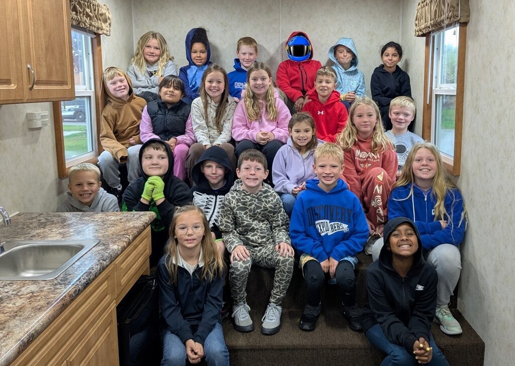 Students in Fire Safety House. 