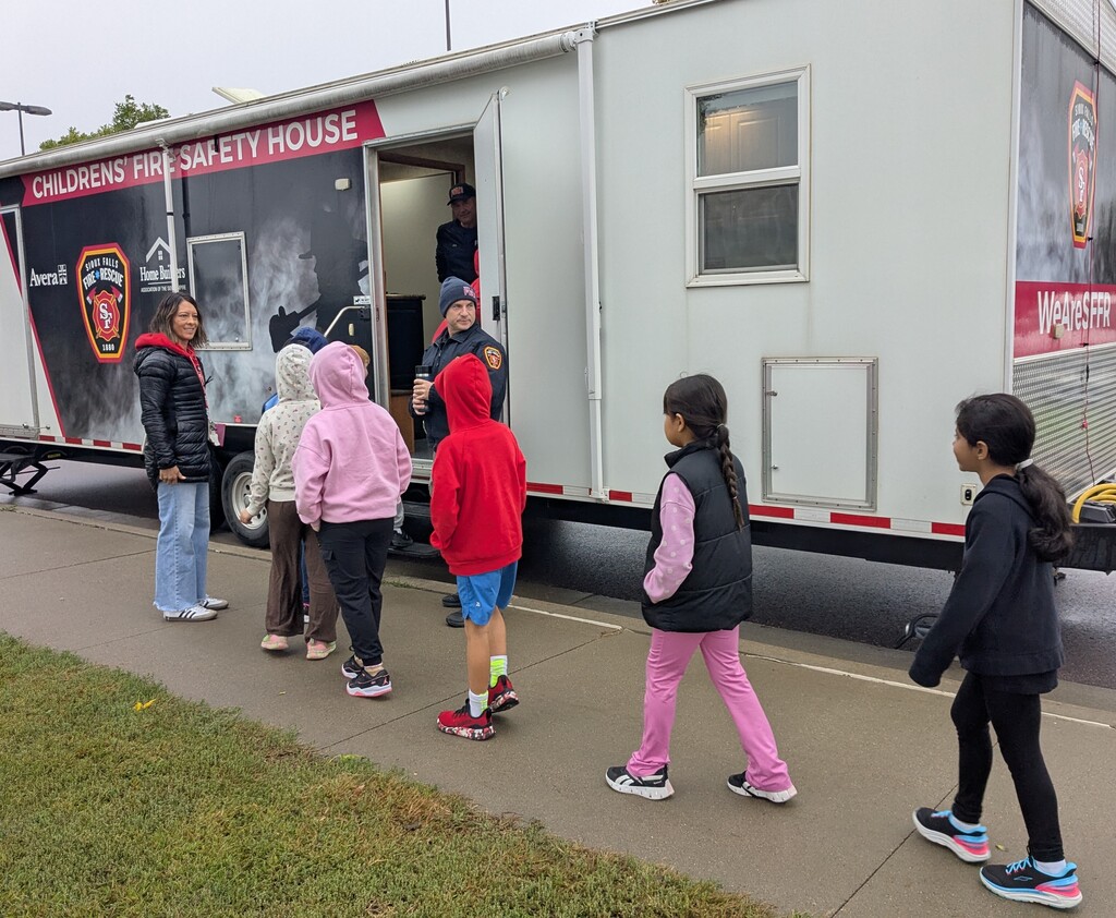 Students entering the Fire Safety House. 