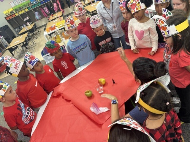 K01 making volcanoes out of apples.