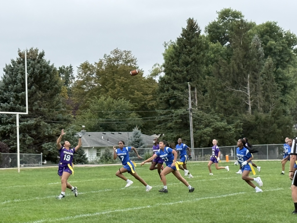 McGovern player going to catch the ball as Whittier players follow. 