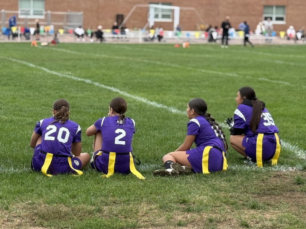 Players intensely watching the game. 