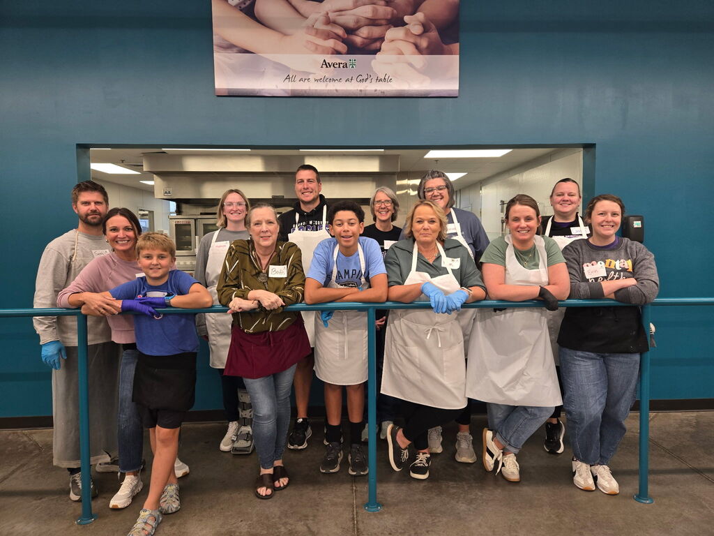 A group of staff members serving at the Banquet. 