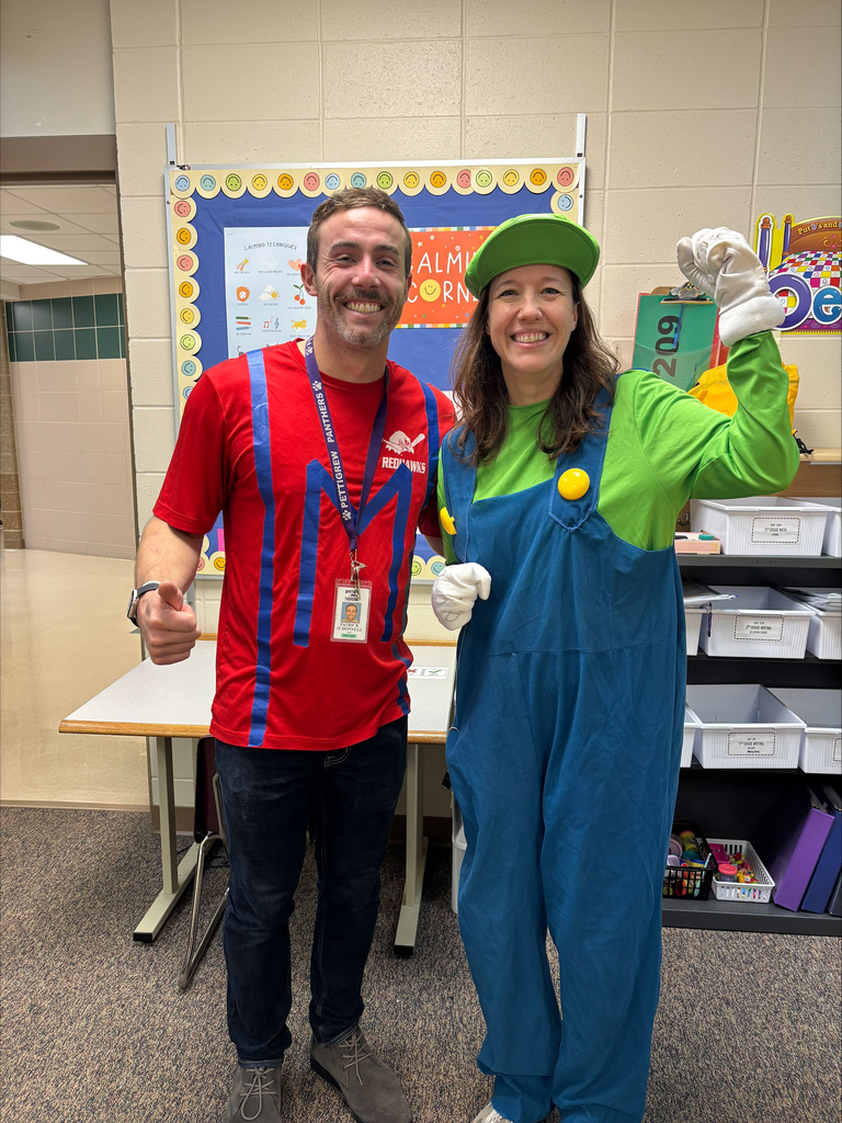 5th grade teachers dressed like Mario and luigi