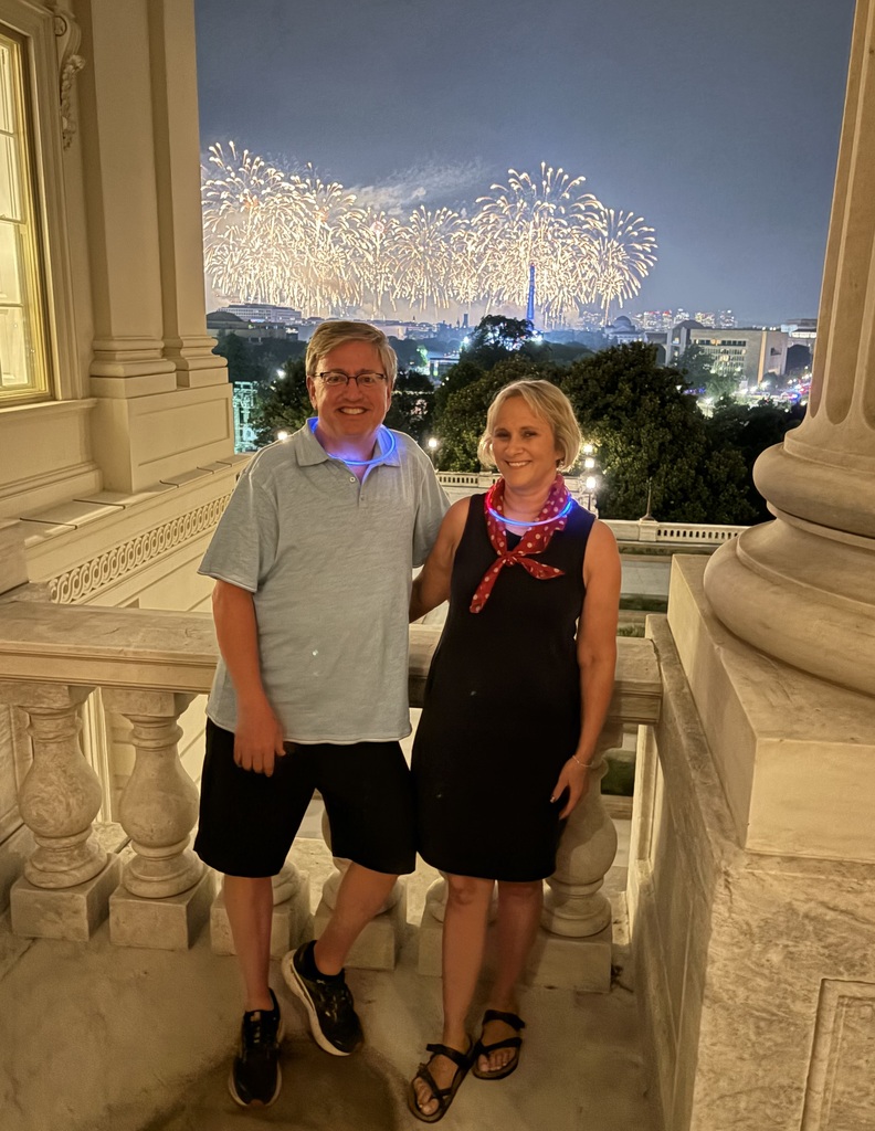 Mrs. Beck and her husband enjoying firewworks.
