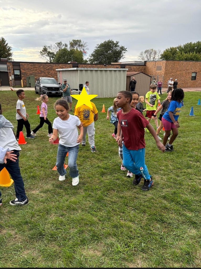 2nd grade students walking around in a circle