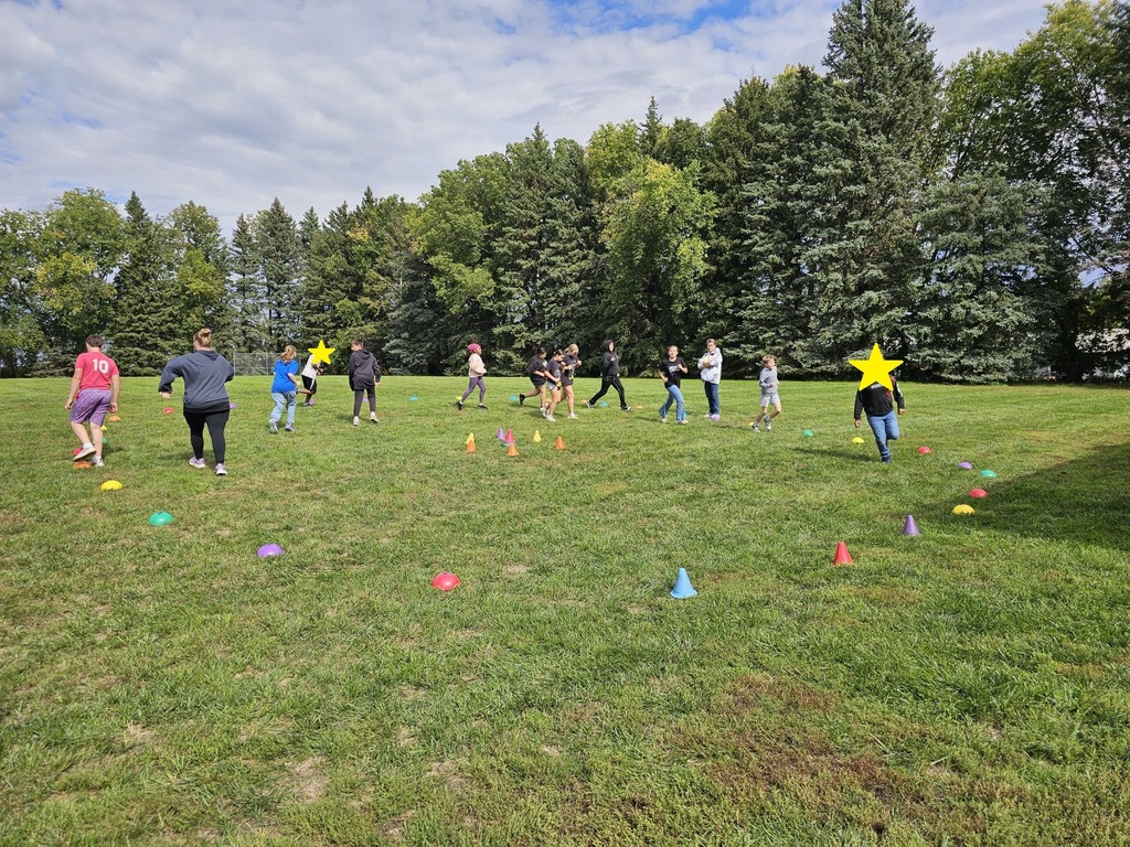 5th grade students walking around in a circle
