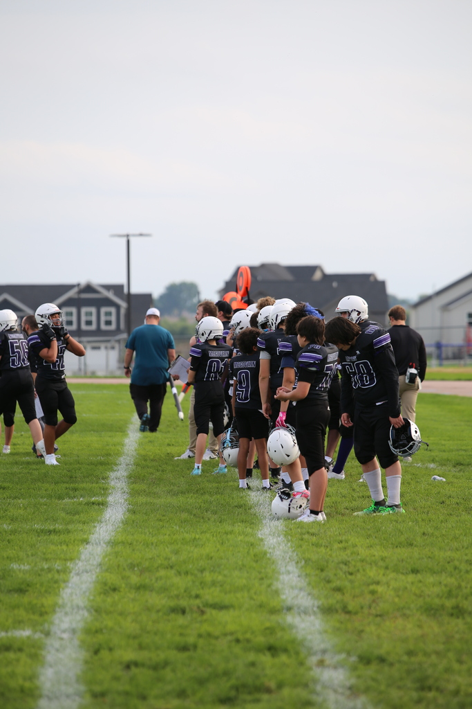 Football team on the sidelines. 