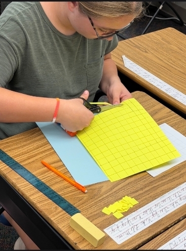 1 girl cutting it squares