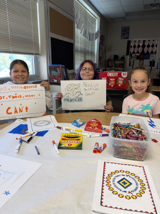 Students working on banners for Native American Day.