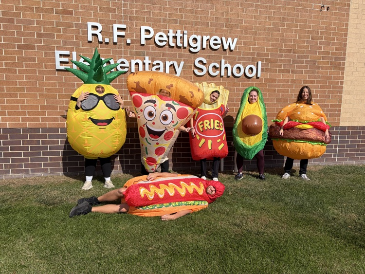 teachers dressed in inflatable food cotumes 
