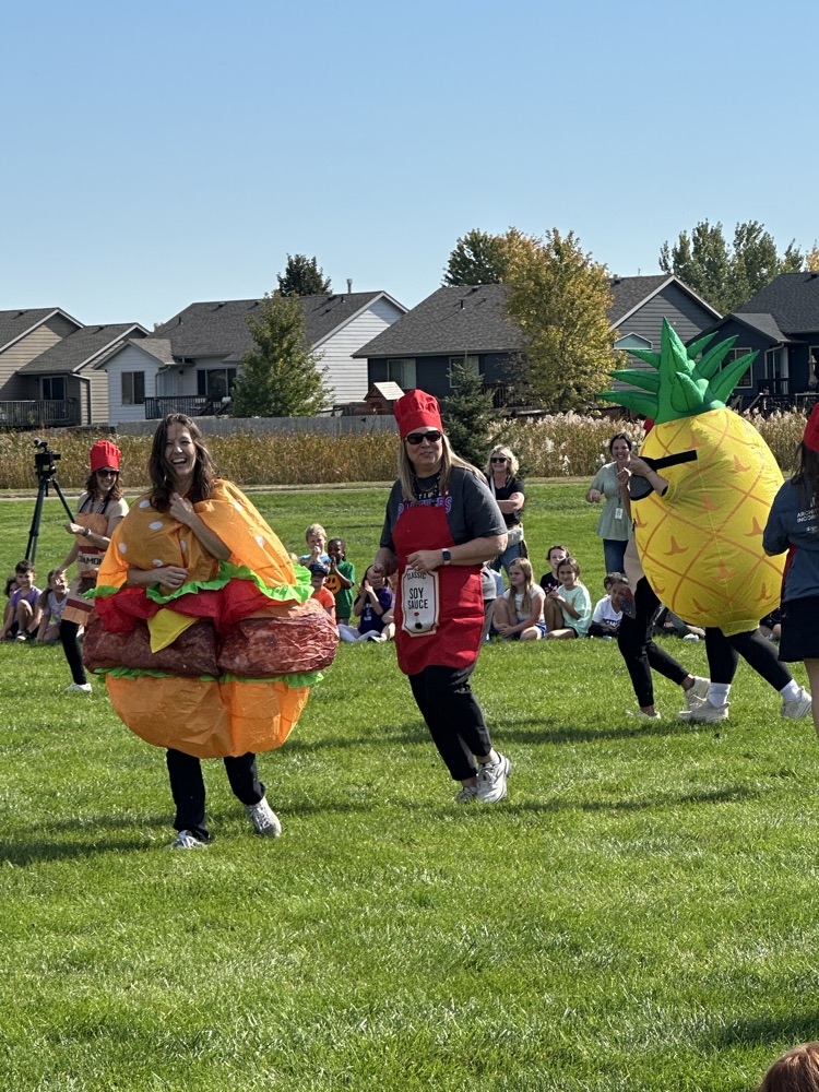 inflatables racing each other in park