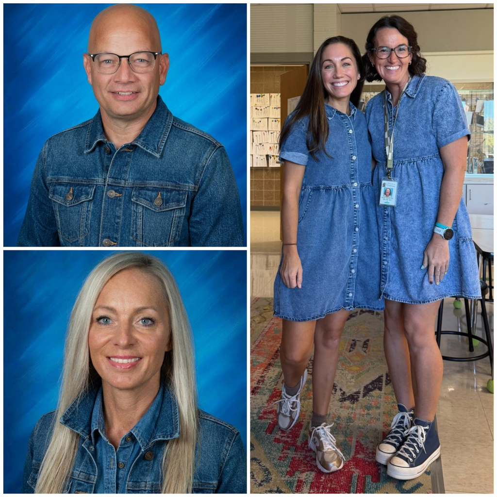 Staff dressed in denim or blue smiling for a photo.