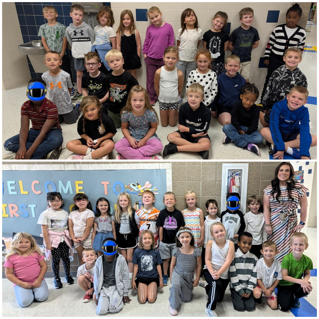 Classroom group photo of students dressed in zebra stripes or black and white for homecoming dress up days.